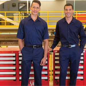 Two men wearing work shirts and work pants