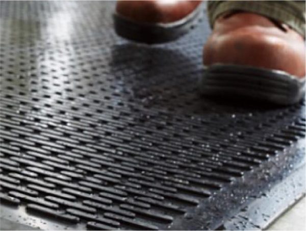 Scraper mat being used by boots